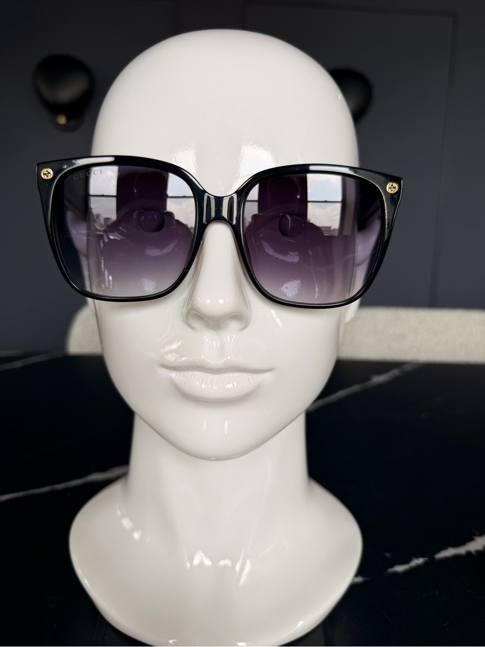 Gucci Black Frame Sunglasses with Gradient Purple Lenses
